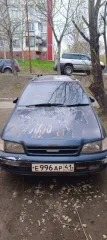 Toyota Caldina 1993 года, универсал. Цвет темно-зеленый. Государственный номер Е996АР41. VIN и номер шасси отсутствуют. Номер кузова ST1950021546. Двигатель модель 9266722, объем 1998 см³, мощность 89 л.с. (65 кВт). Снаряженная масса 1370 кг, полная масса 1870 кг.