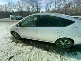 Toyota Prius 2007 года, гибрид, 77 л.с., пробег 295272 км. АКПП (вариатор), передний привод. Двигатель 1NZ-FXE, VIN NHW20-7649237, цвет белый. ПТС (выписка) 9961 770228 от 13.11.2023. В залоге у банка.