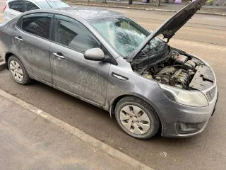 Киа Рио 2014 года, VIN Z94CB41ABFR242235, госномер Н807МЕ71. Объем двигателя 1396 см³, мощность 107 л.с. Цвет кузова темно-серый.