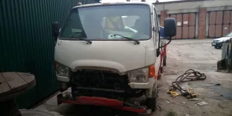 А/м спецназначения автовышка Hyundai E-Mighty VIN KMFGA17PPCC196492, год выпуска 2012, цвет: белый, гос. номер М 516 ХУ 38. Требуется ремонт ходовой части