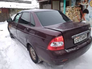 LADA Priora (217030) 2008 года выпуска, VIN: XTA21703080130702. Цвет кузова: Темно-Вишневый. Объем двигателя: 4596 см³, тип: легковой. Пробег: 390817 км. Находится в залоге у ПАО «Совкомбанк».