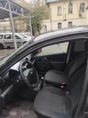 Автомобиль LADA Granta 2017 года выпуска, объем двигателя 1596 см³, мощность 87 л.с., пробег 131978 км. VIN: XТА219010Н0482147.