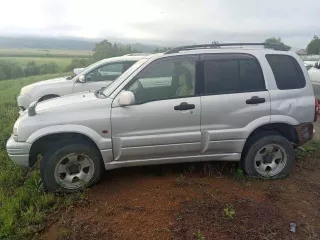Suzuki Escudo, 1999 года выпуска, регистрационный номер С966КМ125, кузов TD62W101254.