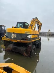 Колесный экскаватор JS160W (заводской №1421674, ГРЗ 4627СН66) транспортное средство