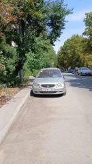 Хендэ Акцент 2003 года, серебристый. VIN: X7MCF41GP4M007673, ПТС: 63РН 449751, госномер Р565КА64. Двигатель бензиновый G4EC3626195, объем 1.5 л (1495 куб. см), мощность 102 л.с. Максимальная масса 1555 кг, масса без нагрузки 1176 кг. Экологический класс не установлен. Произведен ООО ТАГАЗ (Россия).