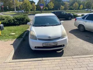 Toyota Prius, 2006, год выпуска: 2006, кузов: NHW207573629, цвет: белый. В залоге у АО "ОТП Банк"