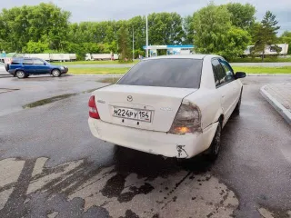 Mazda Familia 1999 года, 110 лс, автомобиль легковой, марка: MAZDA, модель: FAMILIA, VIN: Отсутствует, гос. рег. номер: М224РУ154, год изготовления: 1999