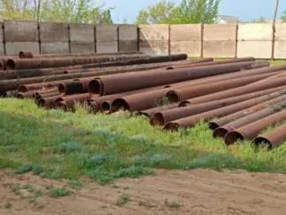 Металлическая труба длиной 10.6 м, диаметром 330 мм.
