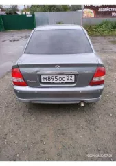 Автомобиль марки Мазда 323, год выпуска: 2003, двигатель: 664628, кузов: JM6BJ10M200209302 Шасси:   Мощность двигателя: 115 л.с.  84.6 кВт  СТС: 9959605720.