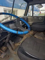 КАМАЗ 49511 1993 года выпуска, цвет защитный зеленый, бензиновый двигатель. Пробег 35074 км. VIN номер XTC43101N2007875.