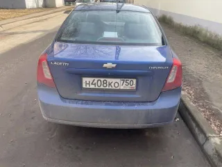Chevrolet Lacetti 2009 года выпуска, синий цвет. VIN: XUUNA196J9C001296.