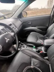 Mitsubishi Outlander 2010, автомобиль Mitsubishi Outlander 2.4, 2010 года выпуска. VIN: JMBXTCW5WAZ001911, двигатель: 4B12GC5799, кузов: JMBXTCW5WAZ001911.