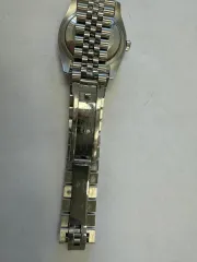 Rolex Datejust ref. 116244 Наручные часы «Rolex Datejust ref. 116244»(идентификационный номер на часах — «63T71126»), корпус круглый из металла серебристого цвета. Замок с штампованной надписью: «ROLЕХ», «GENEУА», «SWISS МАDЕ», б/у.