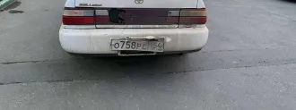 Toyota Corolla 1995, автомобиль Toyota Corolla, 1995 года выпуска, VIN: отсутствует, государственный регистрационный знак: О758РС154, цвет: белый.