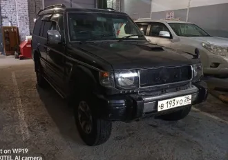 Mitsubishi Pajero 1992 года выпуска, госномер В193УО28. Модель, номер двигателя: 4D56-EF8791, номер кузова: V44-3018708. Мощность двигателя 97 л.с., объем 2476 куб.см., цвет кузова темно-зеленый. КПП автомат, привод 4WD. Пробег более 250 тыс.км. Характеристика: кузов в удовлетворительном состоянии…