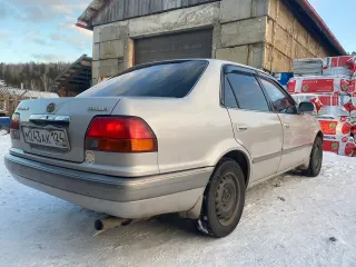 Toyota Corolla, 1997, VIN отсутствует. Характеристика: залог у "Ваш Инвестор". Хрустит наружный шрус с правой стороны. Сайлентблоки и подушки двигателя нужно менять. По корпусу автомобиля множественные следы коррозии и левая сторона в вмятинах.