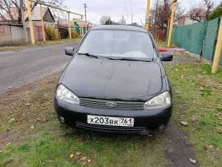 Лада Калина 2010 года, VIN: XTA111940A0113921, цвет черный.