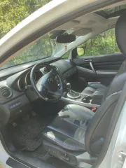 Mazda CX-7 2011 года, 238 л.с., 110000 км, АКПП. Автомобиль Mazda CX-7 2011 года выпуска, госномер А131СТ90, VIN JMZER893800248419. Цвет белый, тип кузова универсал, тип двигателя бензин, мощность 238 л.с., коробка передач АКПП. Техническое состояние условно-пригодное, требует ремонта, на ходу.