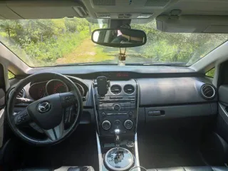 Mazda CX-7 2011 года, 238 л.с., 110000 км, АКПП. Автомобиль Mazda CX-7 2011 года выпуска, госномер А131СТ90, VIN JMZER893800248419. Цвет белый, тип кузова универсал, тип двигателя бензин, мощность 238 л.с., коробка передач АКПП. Техническое состояние условно-пригодное, требует ремонта, на ходу.