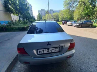 Mitsubishi Lancer 2004 года, 98 л.с., пробег 250000 км, АКПП. Транспортное средство Mitsubishi Lancer 1.6, 2004 года выпуска, регистрационный номер М110НТ21, VIN JMBSRCS3A5U006276.