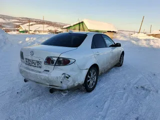 Mazda 6 2004 года выпуска. VIN: JMZGG12F551272370.