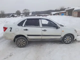Lada Granta, 2013 Легковой автомобиль: марки Lada (ВАЗ) модели Granta, год выпуска - 2013; Идентификационный номер (VIN) - XTA219010DY035331; Мощность двигателя: 87 л.с.; Цвет: белый; Экологический класс: четвертый. Обременено залогом кредитора АО «Тбанк». Адрес местонахождения транспортного…