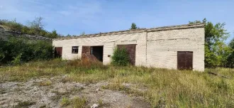 Здания гаража-ангара 547,9 кв.м, главного корпуса 1855,4 кв.м, КПП 28,9 кв.м, автогаража 2513,1 кв.м с земельным участком 26235 кв.м, Курганская область Объекты недвижимого имущества, расположенные на земельном участке, по адресу: Курганская область, г. Курган, ул. Омская, д. 179В Объекты…