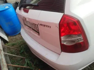 Шевроле Лачетти 2012 года выпуска, VIN XUUNF356JC0014008, госномер С977ХТ55. Учтены коррозийные повреждения, потертости и царапины на ЛКП. Задняя правая фара разбита. На лобовом стекле трещина. Требуется химчистка салона.