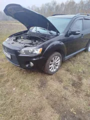 Mitsubishi Outlander 2010, автомобиль Mitsubishi Outlander 2.4, 2010 года выпуска. VIN: JMBXTCW5WAZ001911, двигатель: 4B12GC5799, кузов: JMBXTCW5WAZ001911.