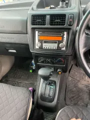 Автомобиль легковой Mitsubishi Pajero Mini, 2004 г.в., цвет серый, идентификационный номер отсутствует, марка Mitsubishi Pajero Mini, гос.рег.знак К044ВТ124. ПТС 25 УМ 814455.