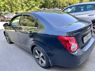 Шевроле Авео 2012 года, черный цвет. VIN: XUUTF69EJC0020305, госномер В400РА21.