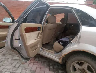 Автомобиль Daewoo Lacetti, 2003 г.в., государственный регистрационный знак Н501ХС55, VIN: KLANA19VD3K892177 цвет серебристый.