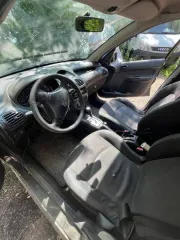 Peugeot 206 2007 года. Регистрационный знак Н858СО799. VIN: VF32AKFWR47759093. Тип: комби (хэтчбек). Цвет черный. СТС 9932134534. ПТС 77РМ109826.