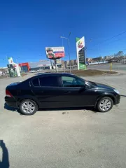 Легковой автомобиль Opel Astra 2012 года 140 л.с. цвет чёрный VIN XWF0AHL69C0017853