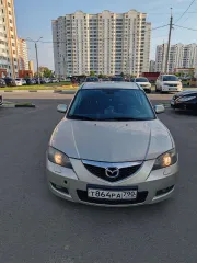 Mazda 3, 2006 МАЗДА 3, 2006 г.в., VIN: JMZBK12Z571549254 Легковой автомобиль МАЗДА 3, 2006 г.в., VIN: JMZBK12Z571549254, кузов № JMZBK12Z571549254, цвет СЕРО-ЗОЛОТИСТЫЙ, мощность (кВт/л.с.): 77.0/104.72 (царапина с левой стороны (передняя и задняя дверь), потёртости на заднем бампере справа, помят…