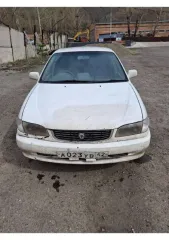 Toyota Corolla 2000 года, 100 л.с., пробег 370000 км, АКПП. Регистрационный номер А023УВ42, номер двигателя AE1105366976. Автомобиль на ходу. Техническое состояние: ходовая гремит, задние стойки полностью не работают, не работает АБС. Внешне автомобиль находится в плохом техническом состоянии…