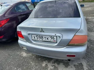 Mitsubishi Lancer 2004 года, 90 л.с., пробег 193880 км. Легковой автомобиль. Mitsubishi Lancer 1.6л, 2004 г.в., ГРЗ Х598ТК96, VIN JMBSNCS3A4U008391.