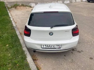 BMW 118I, 2012 года, 170 лс, 164 844 км, АКПП. Идентификационный номер (VIN): WBA1A31040J166109, год изготовления 2012, гос. номер Т144УХ790. Залог в пользу АО "ТБанк", подлежит прекращению по результатам торгов.