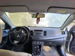 Mitsubishi Lancer 2011 Легковой седан Mitsubishi Lancer 1,5, VIN: JMB5NCY2ABU006835, год выпуска: 2011, цвет: бежевый, тип двигателя: бензиновый, мощность двигателя: 109 л.с. (80,2 кВт), объем двигателя: 1499 куб.см., экологический класс: четвертый. По периметру автомобиля наблюдаются очаги…