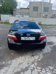 Toyota Camry 2007 года выпуска. Бензин, объем двигателя 2 362 см³, мощность 167 л.с. VIN JTNBE40K203127717. Коробка передач — автоматическая.