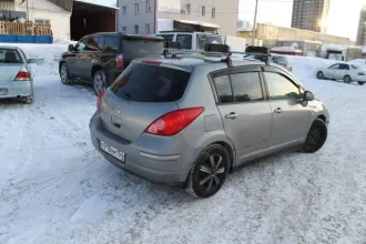 Nissan Tiida 2008 года, 110 л.с., АКПП. Автомобиль легковой Nissan Tiida 1.6, 2008 года выпуска, государственный регистрационный знак Е918ВМ154, VIN 3N1FCAC11UL445513.