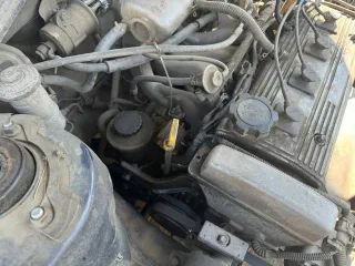 Toyota Carina, 1990 год выпуска, регистрационный знак Р656ЕТ03RUS, VIN не установлен, цвет темно-синий.