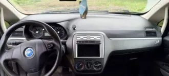 Fiat Punto 2007 года, 77 л.с., пробег 175 000 км, АКПП. Приехала своим ходом. Не работает кондиционер, задние двери открываются только изнутри, ошибка по подушкам, очаги коррозии по кузову. Более подробное техническое состояние выясняйте самостоятельно в ходе осмотра.