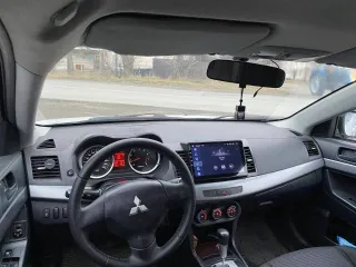 Mitsubishi Lancer 2010 года, 109 л.с., пробег 232 245 км, АКПП, бензин, VIN – JMBSRCY2AAU005626.