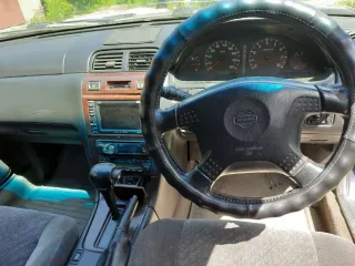 Nissan Cefiro, 1998 год, госномер А228МА122.
