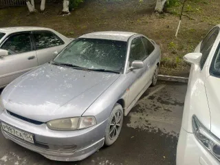 Автомобиль Mitsubishi Mirage, 1997 года выпуска, VIN: отсутствует. Тип ТС: легковой универсал, номер кузова CJ2A0102090, государственный регистрационный номер Р987СА154, паспорт транспортного средства 54НХ962098. Цвет кузова: серый.