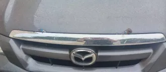 Mazda Tribute 2001 года, 124 лс, пробег 300000 км. VIN: JMZCZ94Z45KM16030. Госномер: Р182КХ39. Двигатель бензиновый, мощность 110,33 кВт (150 л.с.). Цвет кузова серый.