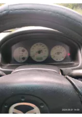 Автомобиль марки Мазда 323, год выпуска: 2003, двигатель: 664628, кузов: JM6BJ10M200209302 Шасси:   Мощность двигателя: 115 л.с.  84.6 кВт  СТС: 9959605720.