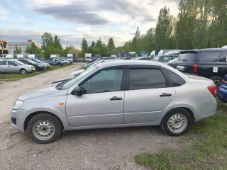 Lada Granta 2016, 87 лс, 142883 км, VIN XTA219010G0405668, гос. номер Е994Р073, цвет серебристый, год выпуска 2016.