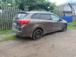 Kia Ceed 2012 года, цвет коричневый, VIN XWEHN812BD0000022.